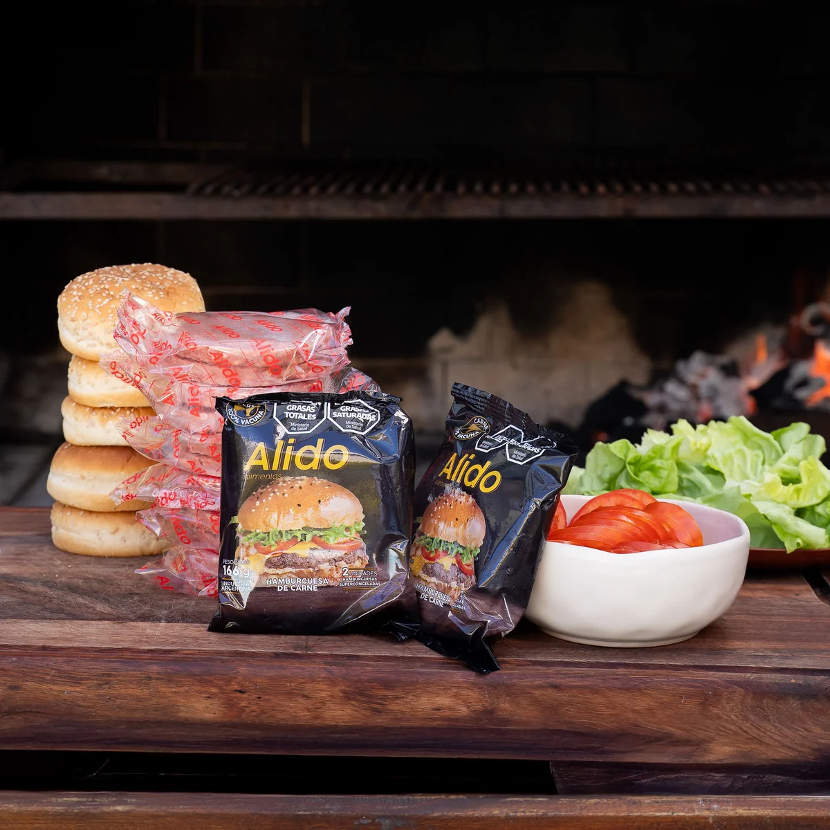 Hamburguesas Alido envasadas junto a la parrilla
