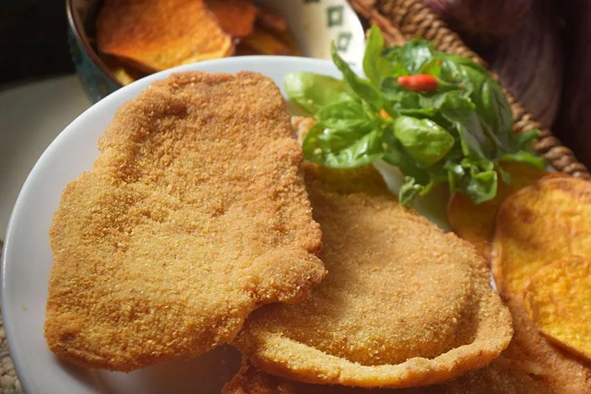 Milanesas Alido doradas servidas en un plato